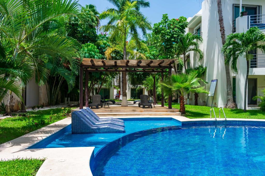 Oportunidad usd 149,500 Condo Playa del Carmen con vistas divinas al jardin